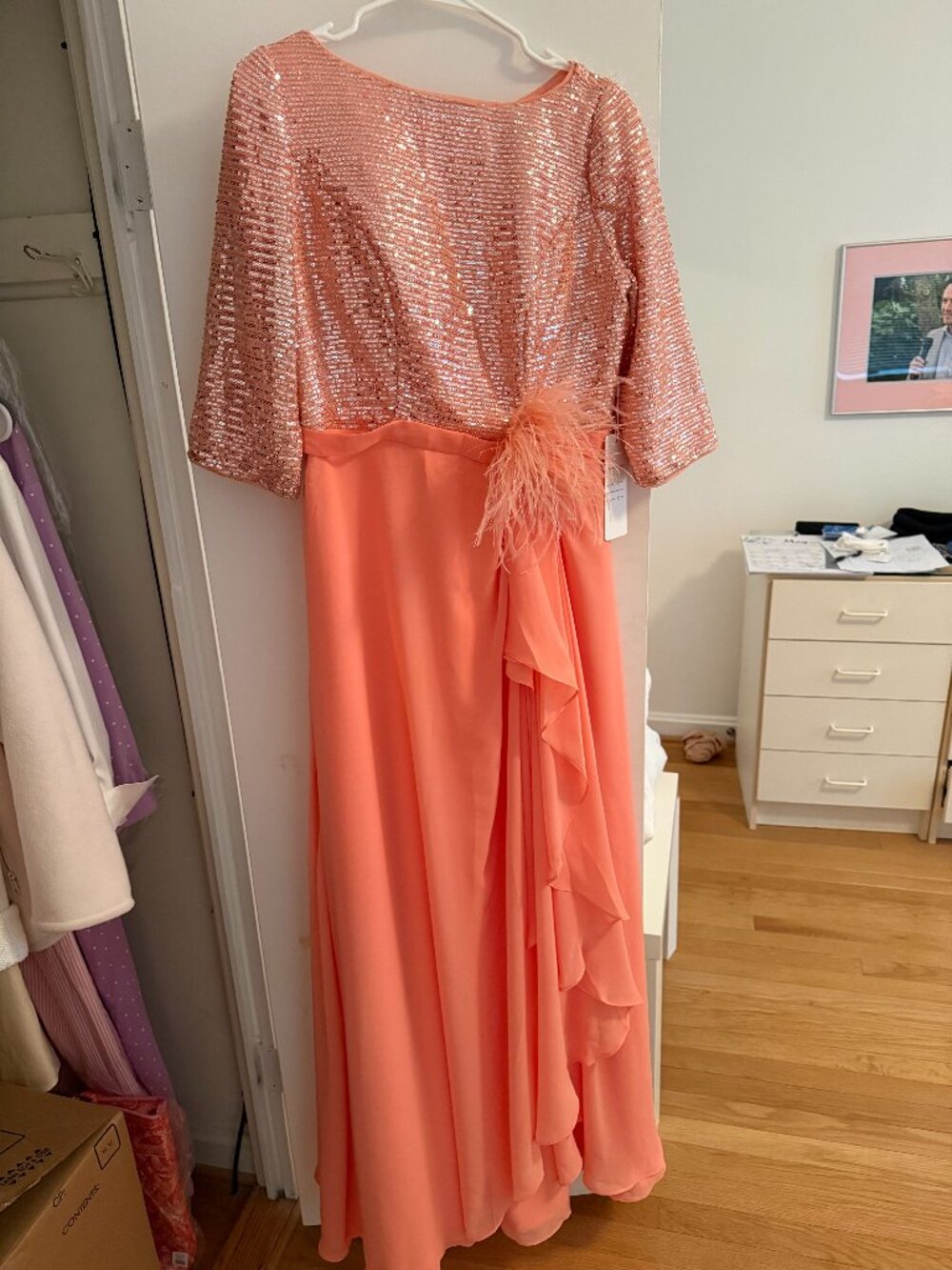 A brand new (with tag) evening dress in coral.